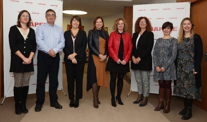 Responsables de Mapfre y de CCOO y UGT, tras la firma del Plan de Igualdad